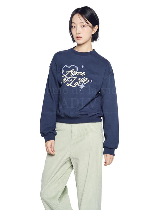 Image of a model wearing Outerwear. Productname: ADLV Script Heart Lettering Women's Sweatshirt in NAVY colour by brand - ADLV