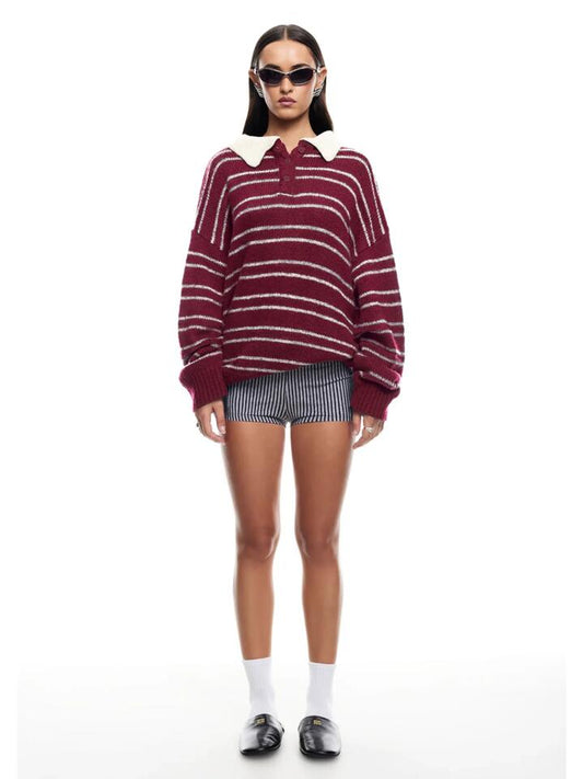 Image of a model wearing Tops. Productname: Lioness Rising Sun Jersey in Crimson colour by brand - Lioness