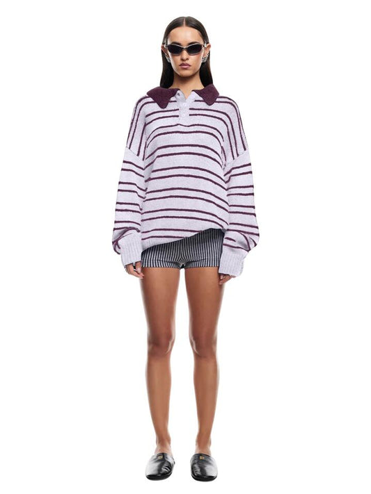 Image of a model wearing Tops. Productname: Lioness Rising Sun Jersey in Storm colour by brand - Lioness