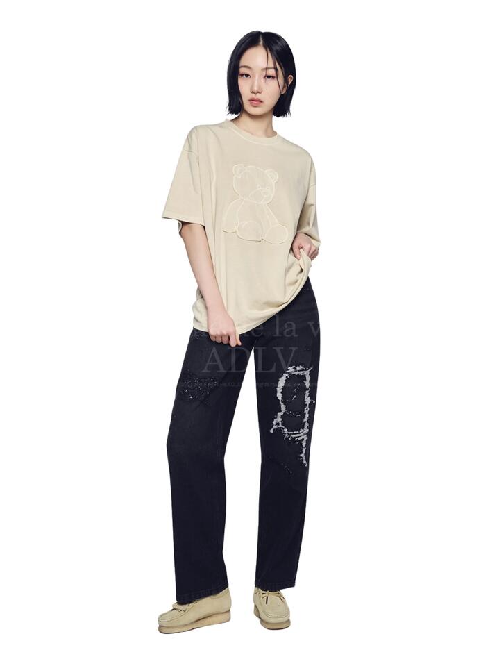 Image of a model wearing Shorts. Productname: ADLV Bear Applique Pigment Washing Short Sleeve T-Shirt in BEIGE colour by brand - ADLV
