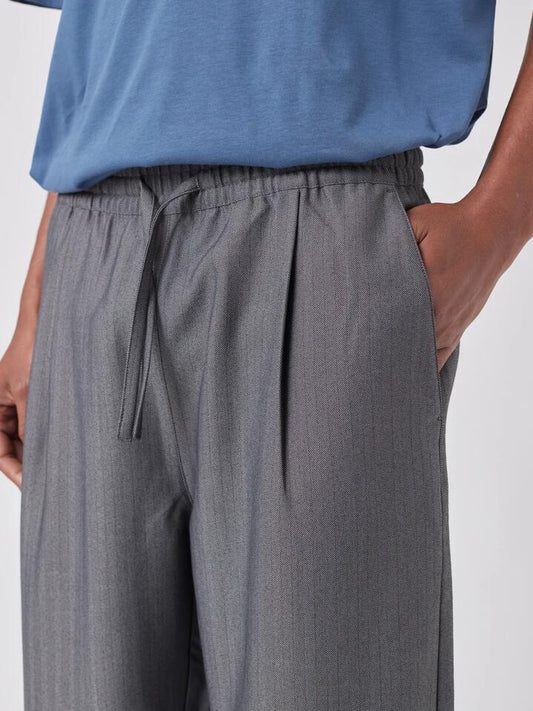 Image of a model wearing Pants. Productname: Barney Cools Boxy Suit Pant in Grey Herrin colour by brand - Barney Cools