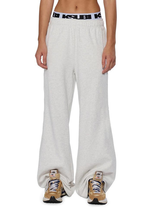Image of a model wearing Denim. Productname: Ksubi Sott Origin Trackpant in Snow Marle colour by brand - Ksubi