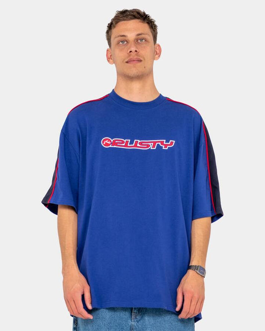 Image of a model wearing Tops. Productname: Rusty Mens Alonso Short Sleeve T-Shirt Marazine Blue - in Marazine Blue colour by brand - Rusty