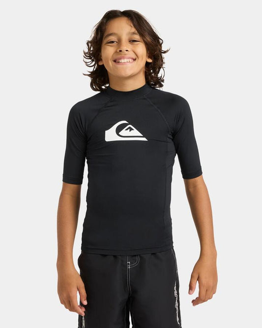 Image of a model wearing Tops. Productname: Quiksilver Boys 8-16 Everyday Upf 50 Short Sleeve Rash Vest Black - in Black colour by brand - Quiksilver