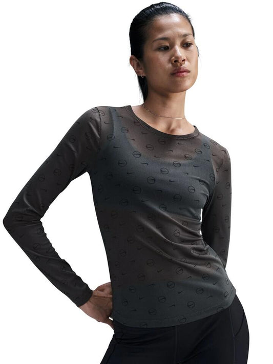 Image of a model wearing Tops. Productname: Nike Sportswear Women's Long-Sleeve Sheer Top in ANTHRACITE colour by brand - Nike