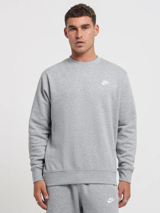 Image of a model wearing Outerwear. Productname: Nike Sportswear Club Crew Sweat in Grey colour by brand - Nike