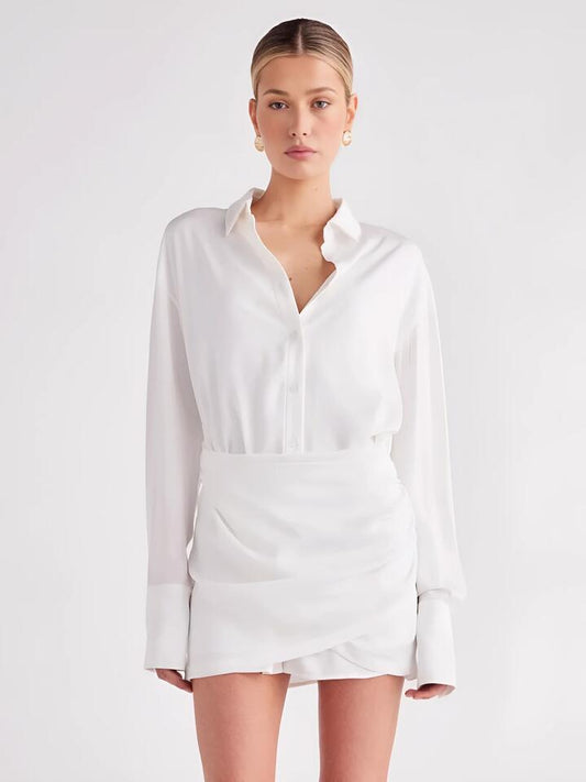 Image of a model wearing Dress. Productname: SNDYS Mae Shirt Dress in WHITE colour by brand - SNDYS