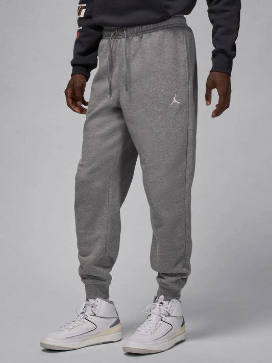 Image of a model wearing Outerwear. Productname: Nike BRK Fleece Pant in Carbon Heat colour by brand - Nike