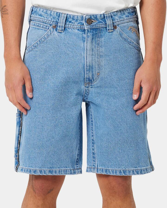 Image of a model wearing Shorts. Product name - A Brand Mens A Brand X Rip Curl A5 Baggy Larry Tapered Denim Shorts Light Vintage Indigo in Light Vintage Indigo colour by brand - A Brand