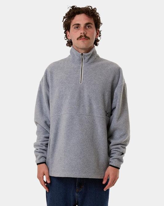 Image of a model wearing Outerwear. Productname: Thrills Mens On The Range Quarter Zip Pullover Sweatshirt White Marle - in White Marle colour by brand - Thrills