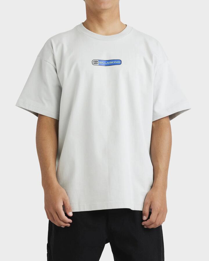 Image of a model wearing Tops. Productname: Billabong - Mens Spec 73 Pill T-Shirt - Silver - in Silver colour by brand - Billabong