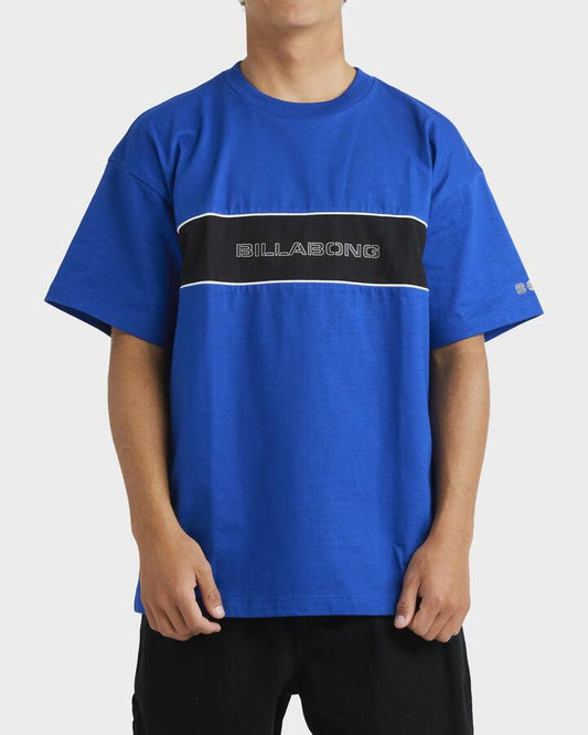 Image of a model wearing Tops. Productname: Billabong - Mens Spec 73 Panel T-Shirt - Cobalt - in Cobalt colour by brand - Billabong