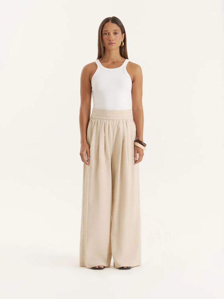 Image of a model wearing Pants. Productname: 4th & Reckless Milo Trouser in Beige colour by brand - 4th & Reckless