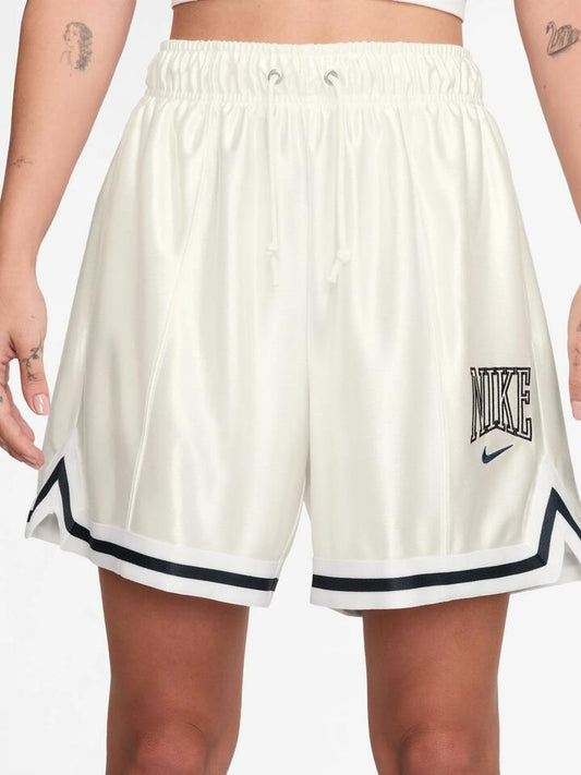 Image of a model wearing Shorts. Productname: Nike Women's 6" Satin Graphic Shorts in Sail/Armory Navy/Armory Navy colour by brand - Nike