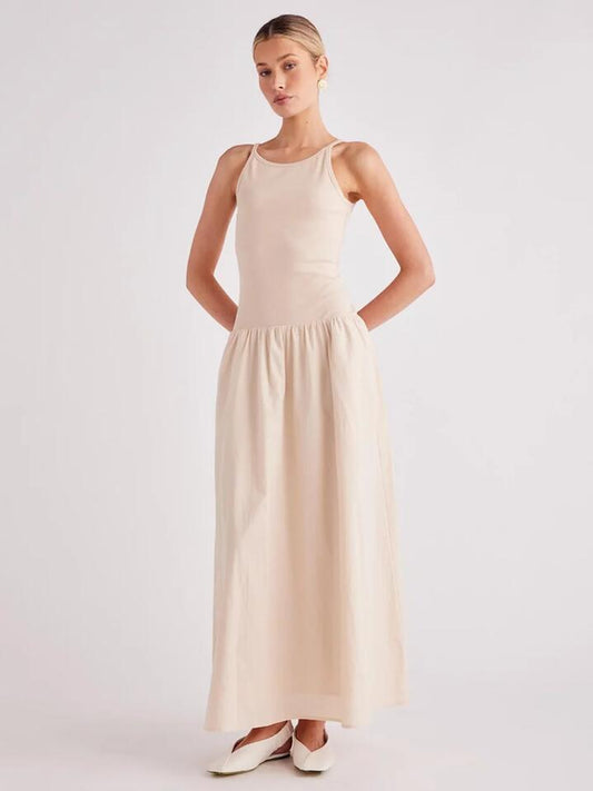 Image of a model wearing Dress. Productname: SNDYS Cruz Maxi Dress in OAT colour by brand - SNDYS