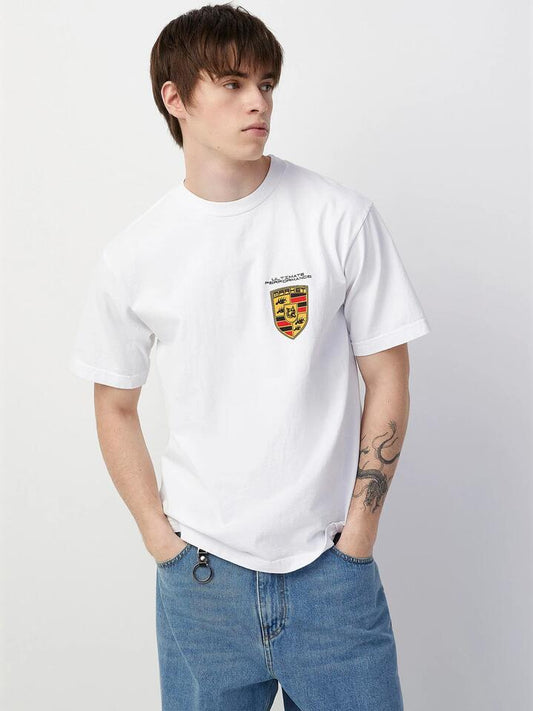 Image of a model wearing Tops. Productname: Market Ultimate Badge T-Shirt in White colour by brand - Market