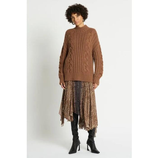 Image of a model wearing Outerwear. Productname: Juniper Cable Knit Jumper in ACORN colour by brand - sass and bide