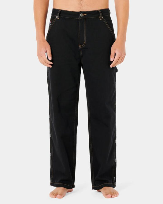 Image of a model wearing Pants. Productname: Rip Curl - Mens Archive Carpenter Pants - Black - in Black colour by brand - Rip Curl