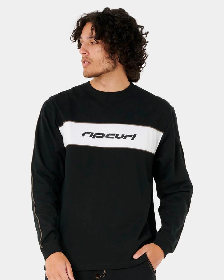 Image of a model wearing Tops. Product name - Rip Curl Mens Archive Long Sleeve T-Shirt Black in Black colour by brand - Rip Curl