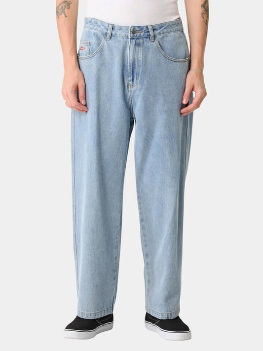 Image of a model wearing Denim. Productname: Xlarge Baggy Bull Denim 91 Pant in WASHED LIGHT BLUE colour by brand - Xlarge