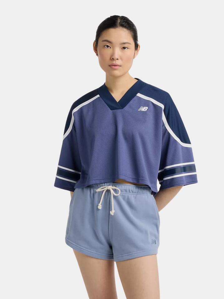 Image of a model wearing Tops. Productname: New Balance Jersey Mesh T-Shirt in Dream State colour by brand - New Balance