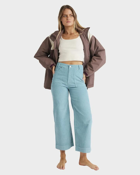 Image of a model wearing Pants. Productname: Billabong - Womens Sea Tone Corduroy Pants - Misty Blue - in Misty Blue colour by brand - Billabong