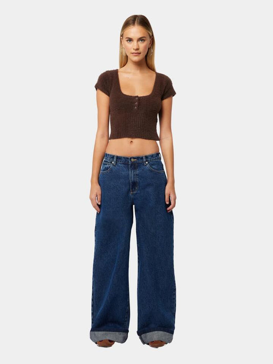 Image of a model wearing Denim. Productname: Abrand 95 Mid Super Baggy Tara in Dark Blue colour by brand - Abrand