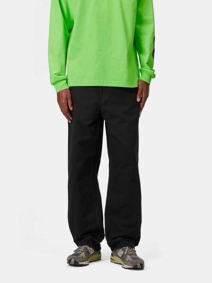 Image of a model wearing Pants. Productname: Carhartt Wip Single Knee Pant in Black Gd colour by brand - Carhartt Wip