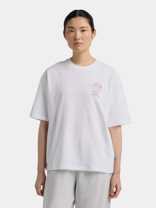 Image of a model wearing Tops. Productname: New Balance New Balance X Debut Vase Tee in White colour by brand - New Balance