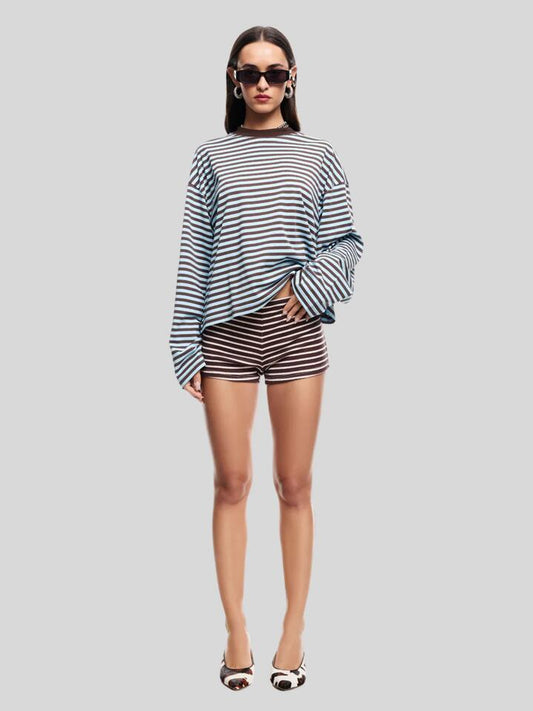 Image of a model wearing Tops. Productname: Lioness Bloom Long Sleeve in Chocolate Sea Stripe colour by brand - Lioness