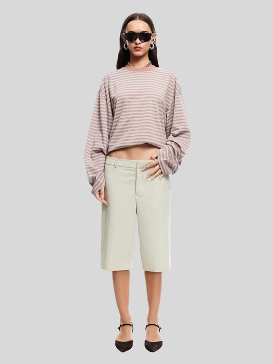 Image of a model wearing Tops. Productname: Lioness Bloom Long Sleeve in Muted Pastels Stripe colour by brand - Lioness