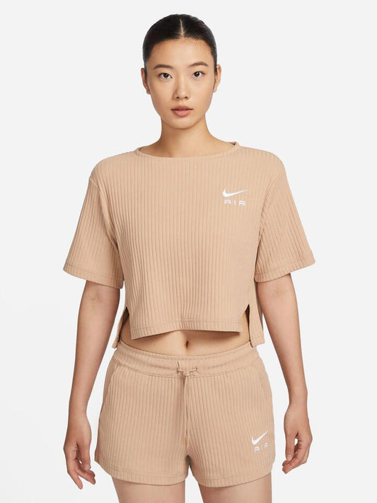 Image of a model wearing Tops. Productname: Nike Sportswear Rib Jersey in Hemp/White colour by brand - Nike
