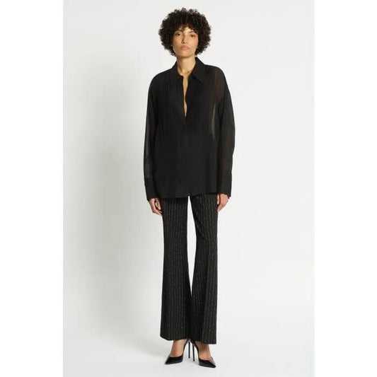 Image of a model wearing Tops. Productname: Soiree Silk Shirt in Black colour by brand - sass and bide
