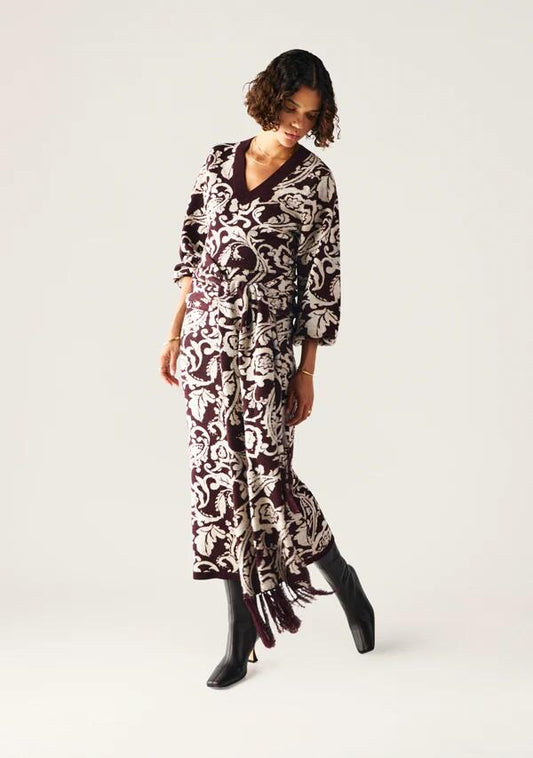 Image of a model wearing Dress. Productname: Seraphine Knit Maxi Dress in Damask colour by brand - MOS The Label