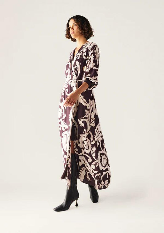 Image of a model wearing Dress. Productname: Seraphine Maxi Wrap Dress in Seraphine Print colour by brand - MOS The Label