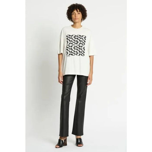 Image of a model wearing Tops. Productname: Logorama Tee in Ivory colour by brand - sass and bide