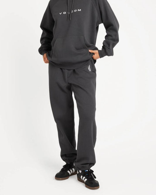 Image of a model wearing Pants. Productname: Volcom - Womens Get More Track Pants - Vintage Black - in Vintage Black colour by brand - Volcom