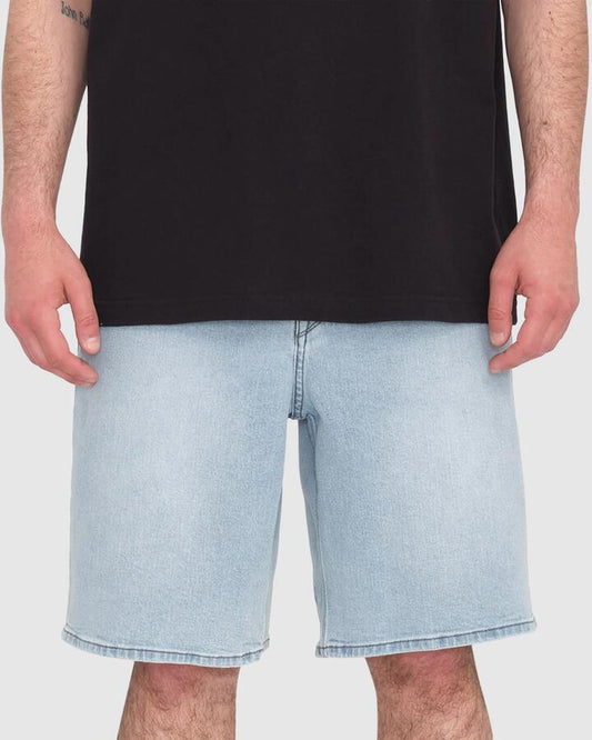 Image of a model wearing Shorts. Product name - Volcom Mens Billow Denim Shorts Desert Blue in Desert Blue colour by brand - Volcom