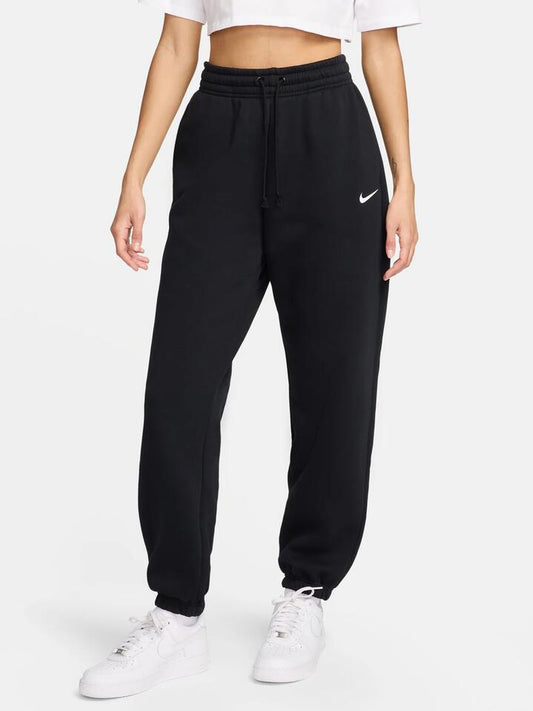 Image of a model wearing Denim. Productname: Nike High-Waisted Oversized Sweatpants in Black/Sail colour by brand - Nike