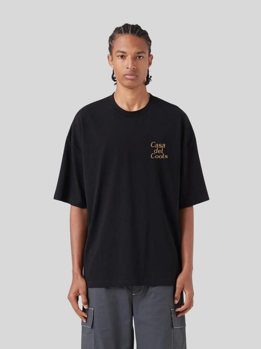 Image of a model wearing Tops. Productname: Barney Cools Casa Del Tee in BLACK colour by brand - Barney Cools