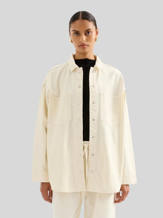 Image of a model wearing Denim. Productname: Nude Lucy Esme Denim Overshirt in Natural colour by brand - Nude Lucy