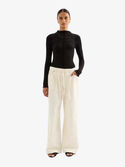 Image of a model wearing Pants. Productname: Nude Lucy Esme Drawstring Jean in Natural colour by brand - Nude Lucy