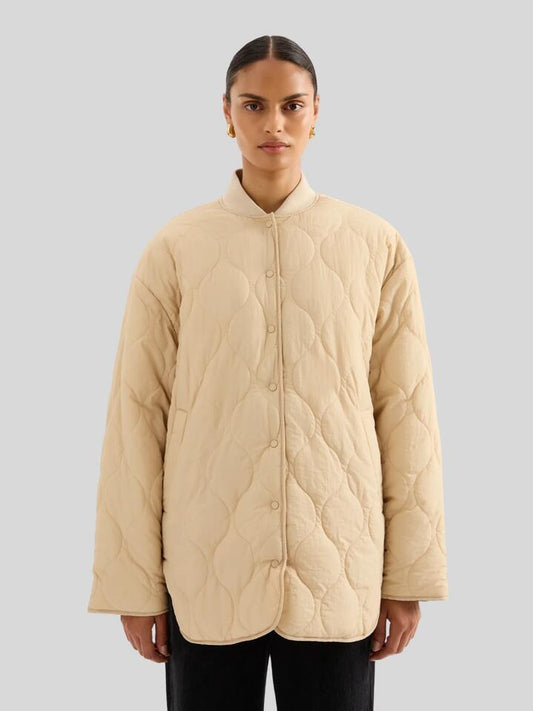 Image of a model wearing Outerwear. Productname: Nude Lucy Kyla Jacket in Tan colour by brand - Nude Lucy