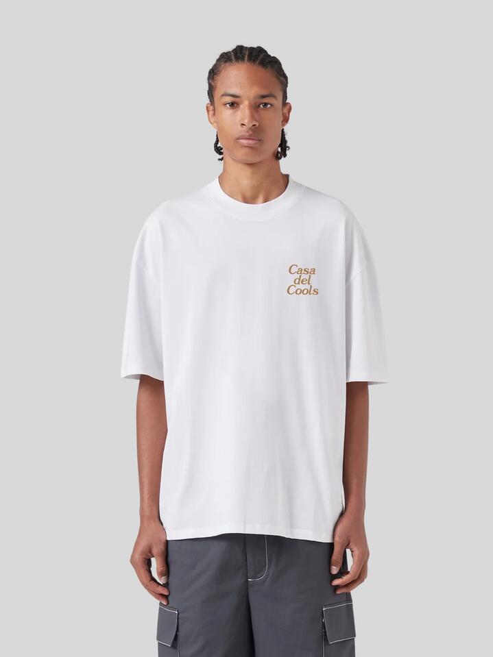Image of a model wearing Tops. Productname: Barney Cools Casa Del Tee in White colour by brand - Barney Cools
