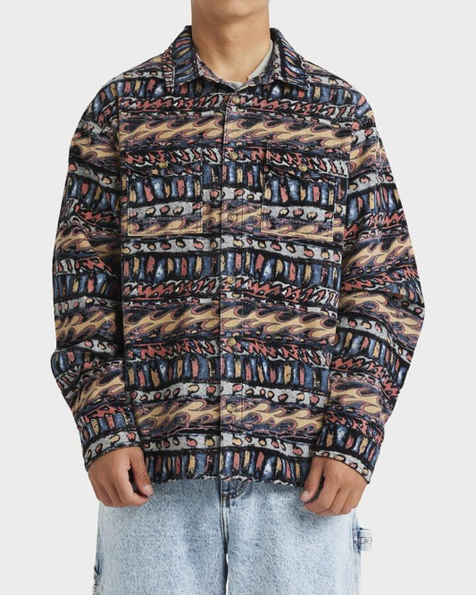 Image of a model wearing Tops. Product name - Billabong Mens Occy Heritage Long Sleeve Shirt Multi - in Multi colour by brand - Billabong
