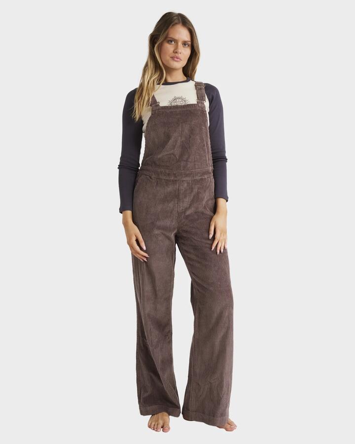 Image of a model wearing Pants. Productname: Billabong Womens Palmy Corduroy Overall Kona - in Kona colour by brand - Billabong