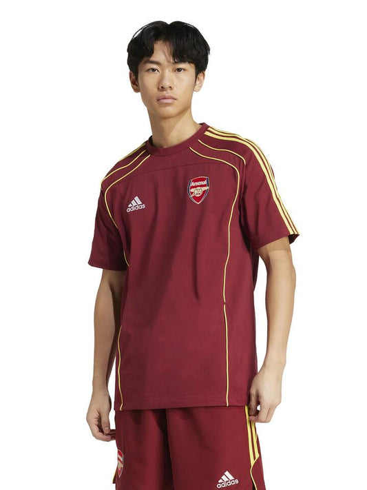 Image of a model wearing Tops. Productname: Adidas AFC UBP Tee in NOBLE MAROON colour by brand - Adidas