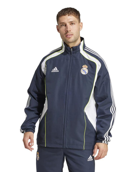 Image of a model wearing Tops. Productname: Adidas Real UBP Track Top in NIGHT NAVY colour by brand - Adidas