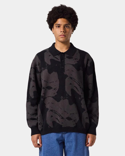 Image of a model wearing Tops. Productname: Former - Mens Distort Long Sleeve Knit Polo - Black - in Black colour by brand - Former