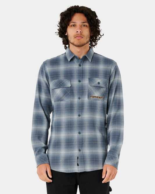 Image of a model wearing Tops. Productname: Rip Curl - Mens Super Computer Long Sleeve Flannel Shirt - Pine Night - in Pine Night colour by brand - Rip Curl